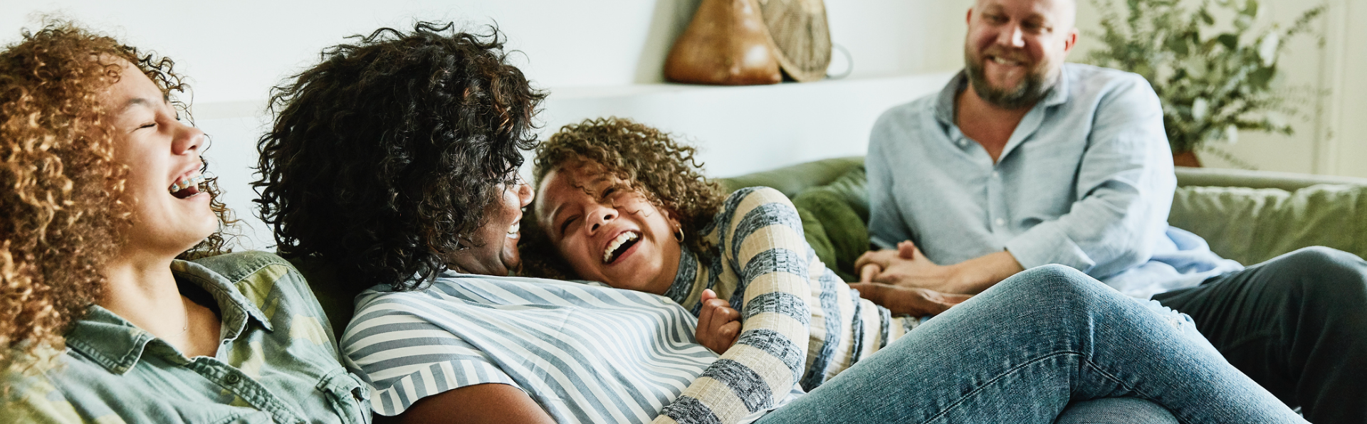 group on couch laughing