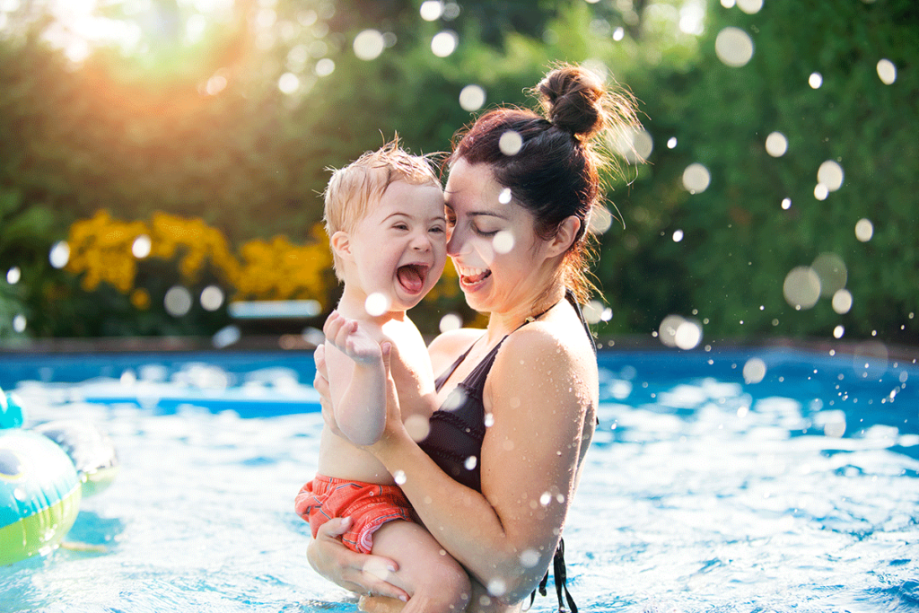 Special Needs Child in pool with mother