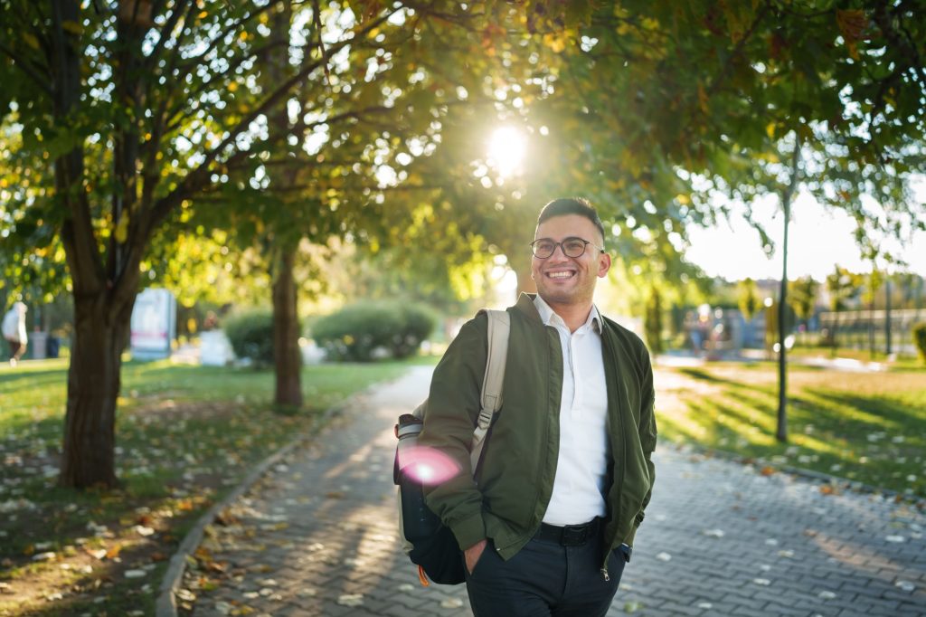 Young man walking in park